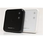 Honeywell Home DT4 Programovatelný bezdrátový termostat šedý. 7 denní program